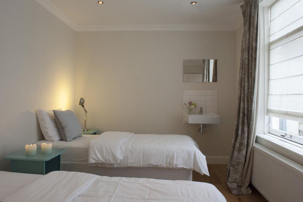 Canal Studio Apartment Amsterdam Værelse billede